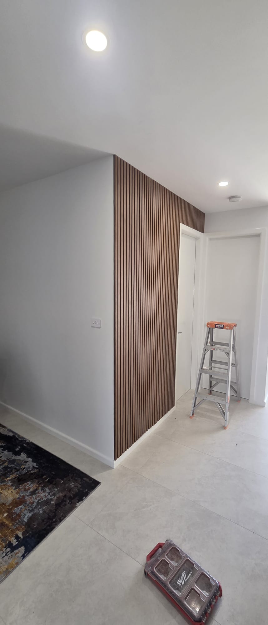 Hallway slat wall and repaint